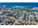 Scenic aerial view of a beachside community with residential houses and waterfront access at 500 79Th Ave, St Pete Beach, FL 33706