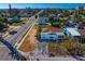 Quaint coastal home awaiting renovation, featuring a driveway and fenced yard near neighborhood amenities at 500 79Th Ave, St Pete Beach, FL 33706