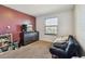 This bedroom features neutral carpet, a large window and a closet for storage at 5147 Brickwood Rise Dr, Wimauma, FL 33598