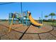 Colorful community playground featuring a slide, climbing frame, and play area for active children to enjoy at 5147 Brickwood Rise Dr, Wimauma, FL 33598