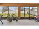 Enjoy the outdoors bug-free in this large screened lanai with a view of the backyard at 5147 Brickwood Rise Dr, Wimauma, FL 33598