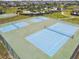 Active community featuring well-maintained tennis courts for recreational enjoyment and friendly competition at 5147 Brickwood Rise Dr, Wimauma, FL 33598