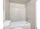 This bathroom features a tub shower combination at 5310 Bellefield Dr, Tampa, FL 33624