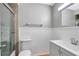 Updated bathroom featuring tile accents, white wainscoting and updated vanity at 5310 Bellefield Dr, Tampa, FL 33624