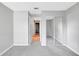 This bedroom features neutral carpet and a mirrored closet at 5310 Bellefield Dr, Tampa, FL 33624