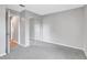 This bedroom features neutral carpet and a mirrored closet at 5310 Bellefield Dr, Tampa, FL 33624