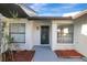 Inviting entrance featuring neutral tones and a view of the front door at 5310 Bellefield Dr, Tampa, FL 33624