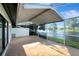 Relaxing screened-in patio offers stunning waterfront views, perfect for enjoying peaceful outdoor living at 5310 Bellefield Dr, Tampa, FL 33624