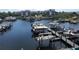 Aerial view of boat docks and buildings shows the expansive waterfront property at 5712 Biscayne Ct # 203, New Port Richey, FL 34652