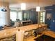 Bright open-concept living space with modern decor and plenty of natural light at 5712 Biscayne Ct # 203, New Port Richey, FL 34652