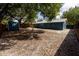 Large, sunny backyard with storage shed and full privacy fence at 5806 12Th S Ave, Tampa, FL 33619