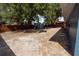 View of expansive backyard with wooden shed and privacy fence at 5806 12Th S Ave, Tampa, FL 33619