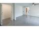 Bright bedroom with gray tile flooring and walk-in closet, perfect for modern living at 5806 12Th S Ave, Tampa, FL 33619