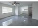 Bright bedroom with gray tile flooring and an en-suite bathroom with dual vanities at 5806 12Th S Ave, Tampa, FL 33619