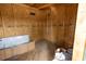 An unfinished storage shed interior ready for customization at 5806 12Th S Ave, Tampa, FL 33619