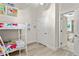 Bedroom with bunk beds and view to a bathroom at 600 Bayway Blvd # 504, Clearwater Beach, FL 33767