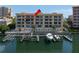 Condo building overlooking boat docks on the water at 600 Bayway Blvd # 504, Clearwater Beach, FL 33767