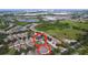 Aerial view of the community highlighting the property and surrounding neighborhood amenities at 6931 Surrey Hill Pl, Apollo Beach, FL 33572