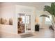 Inviting entryway with tile floors, study and neutral decor and beachy decor at 6931 Surrey Hill Pl, Apollo Beach, FL 33572