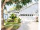 Charming single Gathering home with lush landscaping and a two car garage at 6931 Surrey Hill Pl, Apollo Beach, FL 33572