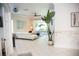 Open living area with tile floors, sliders to back patio and view to study at 6931 Surrey Hill Pl, Apollo Beach, FL 33572