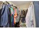 Walk-in closet with ample storage space, clothing racks, and shelving for shoes and accessories at 8703 Bardmoor Blvd # 304, Seminole, FL 33777