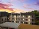 The exterior of this apartment building features balconies, covered parking, and secure stairwells at 8703 Bardmoor Blvd # 304, Seminole, FL 33777