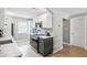 Well-lit kitchen with modern, stainless appliances and stone countertops at 8703 Bardmoor Blvd # 304, Seminole, FL 33777