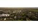 Desirable neighborhood with mature trees and landscaping, as well as sidewalks and multiple ponds and water features at 8732 Rain Song Rd, Sarasota, FL 34238