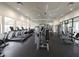 Well-equipped gym featuring treadmills, stationary bikes, and weight machines at 8732 Rain Song Rd, Sarasota, FL 34238