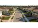Street view in neighborhood featuring well-maintained homes, sidewalks, and landscaped yards, enhancing curb appeal at 8732 Rain Song Rd, Sarasota, FL 34238