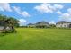 Expansive backyard featuring a large green lawn, perfect for outdoor activities and gatherings at 9843 Cabernet Ave, Seffner, FL 33584