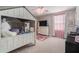 Charming bedroom with a cute house bed, ceiling fan and carpeted flooring at 9843 Cabernet Ave, Seffner, FL 33584