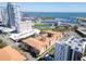 The aerial view features the building, surrounding cityscape, and waterfront at 100 4Th S Ave # 132, St Petersburg, FL 33701