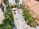Beautiful aerial view showcasing the community's lush landscaping and inviting pool and lounging areas at 100 4Th S Ave # 132, St Petersburg, FL 33701