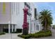 Chihuly Collection building featuring a glass sculpture and landscaped surroundings, showcasing art and culture at 100 4Th S Ave # 132, St Petersburg, FL 33701