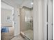 Walk-in shower with glass enclosure and access to the rest of the house at 100 4Th S Ave # 132, St Petersburg, FL 33701