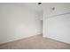Bedroom with neutral carpet and a closet at 100 4Th S Ave # 132, St Petersburg, FL 33701