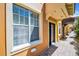 Exterior of a building with large windows, brick path, and covered walkway at 100 4Th S Ave # 132, St Petersburg, FL 33701