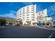 Modern hospital exterior featuring a colorful design and sky bridge access offers patient-centric healthcare services at 100 4Th S Ave # 132, St Petersburg, FL 33701