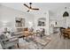 Stylish living room with ample seating, modern decor, and open access to the kitchen area at 100 4Th S Ave # 132, St Petersburg, FL 33701