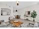 Cozy living room with open layout, wood accents, and stylish seating area at 100 4Th S Ave # 132, St Petersburg, FL 33701