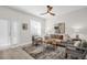 Comfortable living room featuring neutral tones, modern decor, and a view to the outside patio at 100 4Th S Ave # 132, St Petersburg, FL 33701