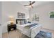 Cozy main bedroom with ceiling fan, carpet and two matching bedside tables at 100 4Th S Ave # 132, St Petersburg, FL 33701