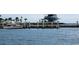 Waterfront with luxury yachts docked along a well-maintained pier against a clear blue sky at 100 4Th S Ave # 132, St Petersburg, FL 33701