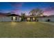 Charming single-story home featuring a well-maintained lawn and front-facing garage in a quaint neighborhood at 10717 Drummond Rd, Tampa, FL 33615