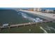 Aerial shot of the pier and beach, showcasing waterfront dining and ocean views at 11 San Marco St # 407, Clearwater Beach, FL 33767