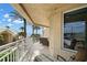 Enjoy views from the tiled balcony of this beachfront property, featuring comfortable patio furniture at 11 San Marco St # 407, Clearwater Beach, FL 33767