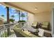 Relax on this balcony with stunning views and patio furniture perfect for outdoor living at 11 San Marco St # 407, Clearwater Beach, FL 33767