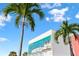 Welcome to Clearwater Beach sign with blue skies and palm trees at 11 San Marco St # 407, Clearwater Beach, FL 33767
